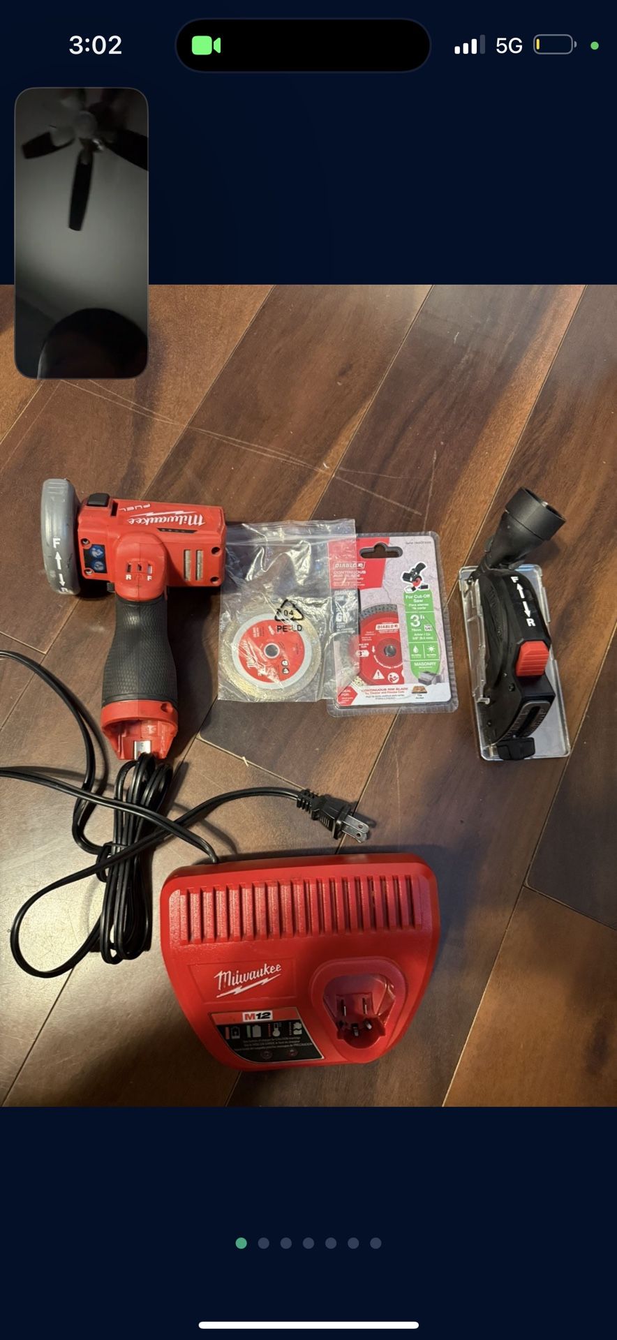 milwaukee hand saw with accessories and charger / No Battery.!