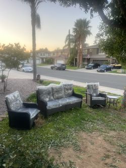 3 seater outdoor patio furniture couch with 2 swivel chairs. And coffee table