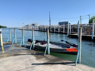 Jon Boat Bass Boat 14 Foot MotorGuide X3 45 Lb Trolling Moror 9.9 Evinrude Casting Deck With Compartments