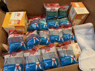 Numerous new Cloth Diapers, covers, and inserts.
