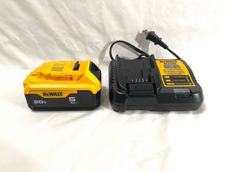 Brand new DeWalt 5Ah battery, and new charger.