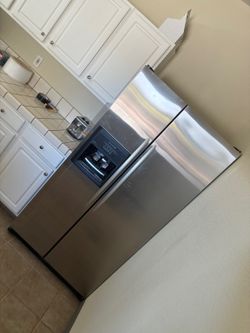 Stainless Steel Side-by-Side Refrigerator with Ice and Water Dispenser