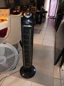 UTILI TECH SWIVEL FLOOR FAN VERY QUIET HAS REMOTE AN COMES OUT ICE COLD 24 FIRM