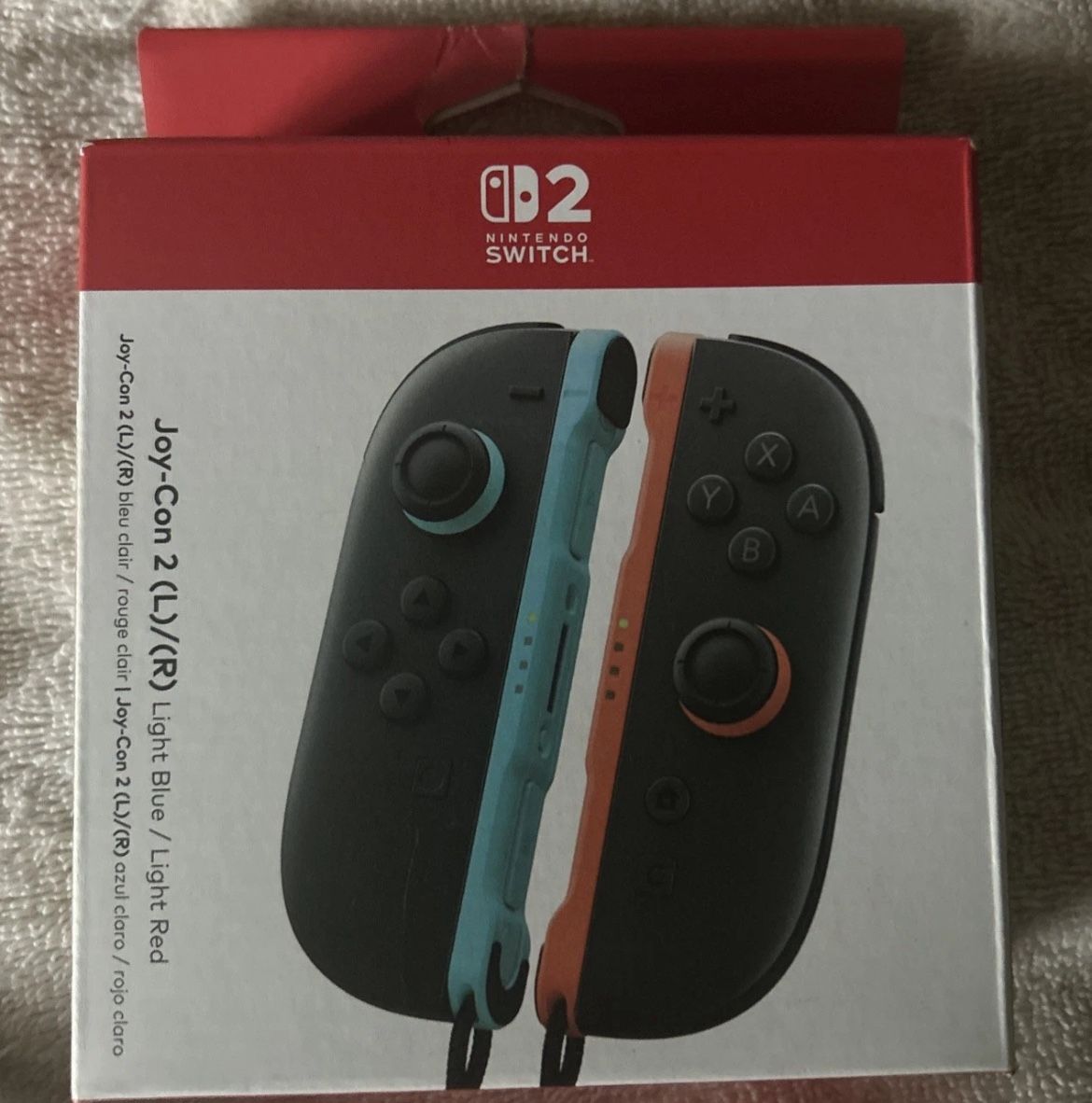 Nintendo Switch Joy-Con 2 (L)/(R) Light Blue/Light Red & Screen Protector BUNDLE