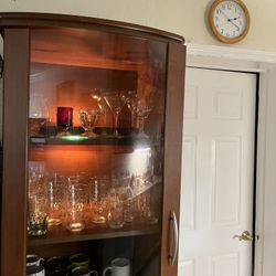 Cabinet and items $148