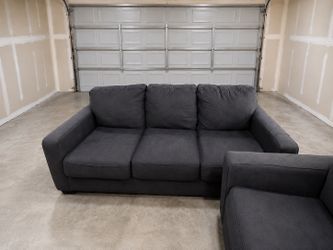 Free delivery on the weekend. Dark grey couch
