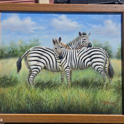 "Charming framed painting of two zebras in a sunlit savanna
