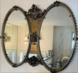 Antique double oval mirror