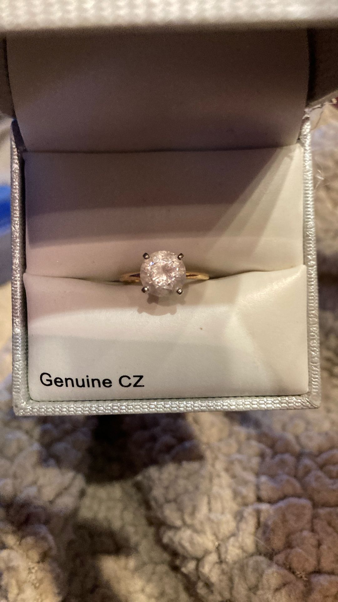 Genuine CZ in 14 karat gold setting