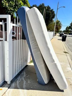 FREE!!!  2 twin mattresses GOOD