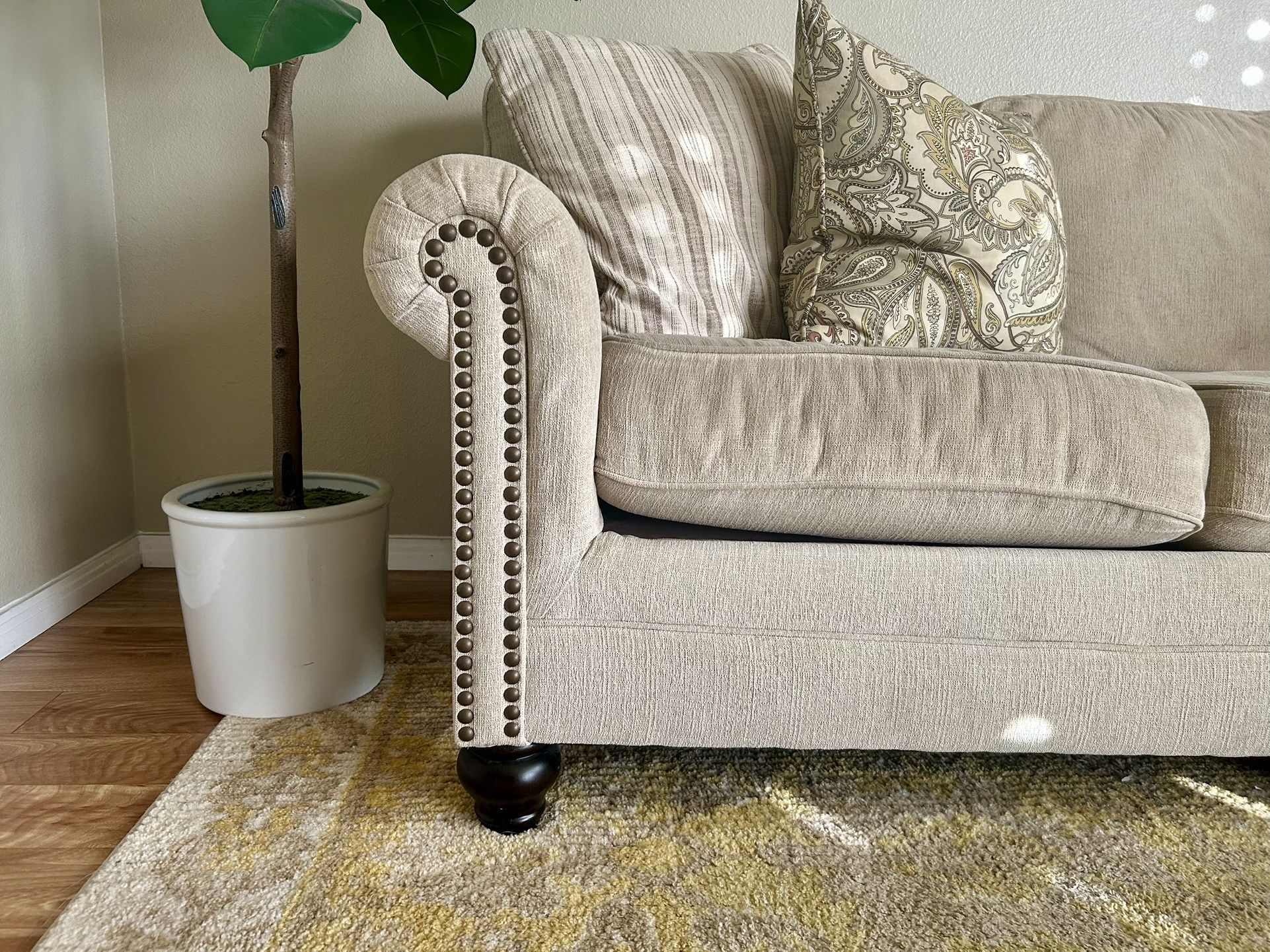 Beige Couch And Coordinating Arm Chair