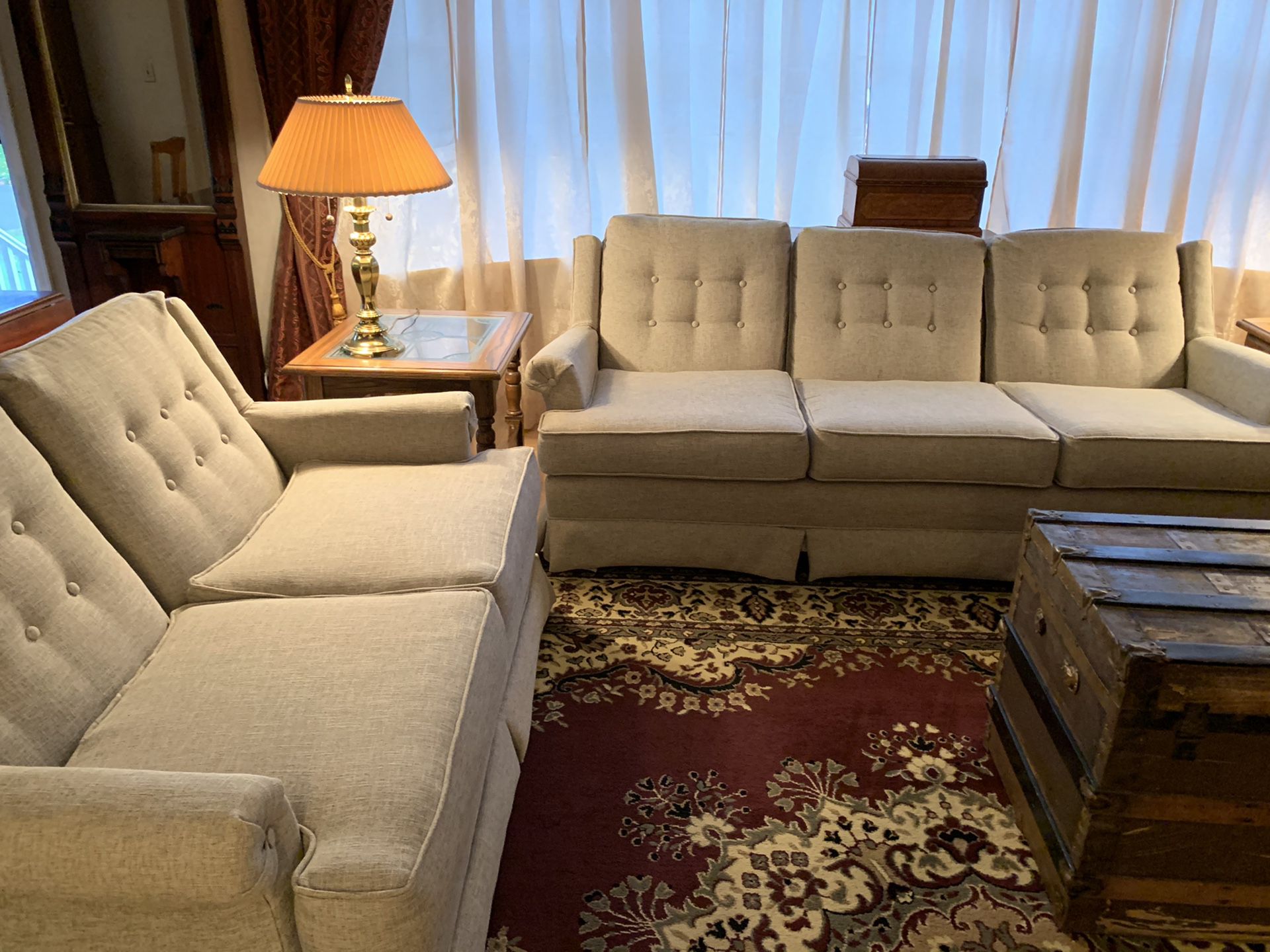 Reupholstered couch and loveseat