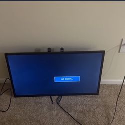 40 Inch TV w/ Wall Mounts