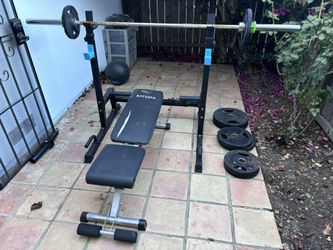 Squat Rack, Olympic Bar And Weight Plates