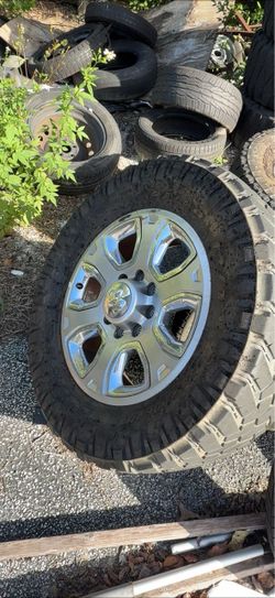 Dodge ram 2500 rims and tires 5 of them