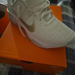 Size 11 WOMANS NIKES