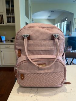 Brand new, barely used pink diaper bag