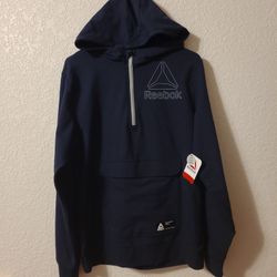 REEBOK  PULL OVER  SIZE  SMALL/ MEDIUM 