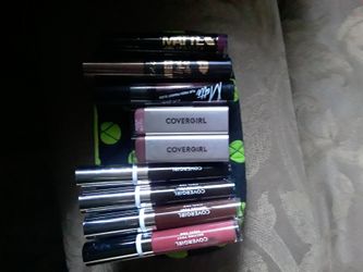 4 Cover Girl melting pout vinyl vow, 2 Cover girl lipsticks,3 Matte Liquid Lipsticks L.A Girls.