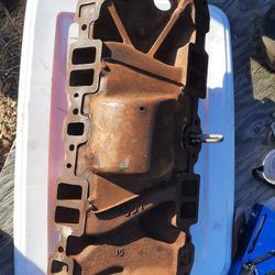 Chevy 350 cast iron manifold intake 