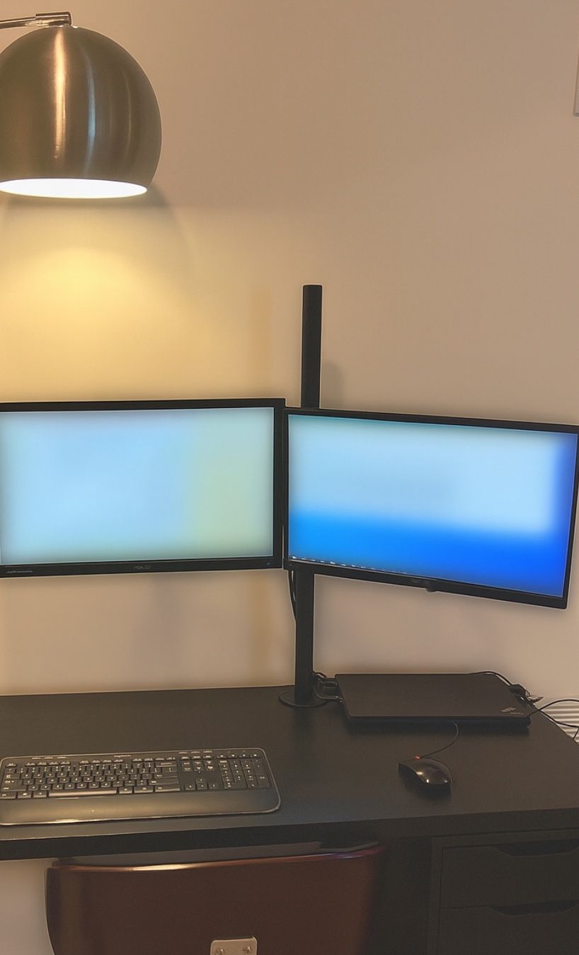 Two LCD Monitors And Dual Monitor Arm Stand