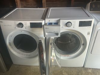 LG High Efficiency Stackable Medium ( 4.5-cu ft ) Front Load Washer ( White . LG 7.4-cu ft Stackable Vented Electric Dryer ( White
