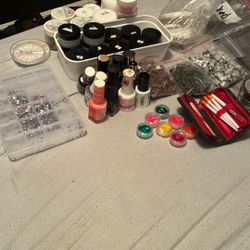 Duffle bag full of nail supplies 