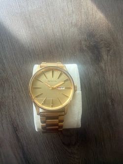 Gold Nixon Sentry