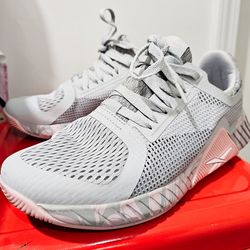 Worn once women size US 8.5 Reebok sneakers.