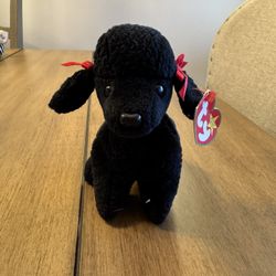 Ty Beanie Baby named Gigi the Poodle dog. 