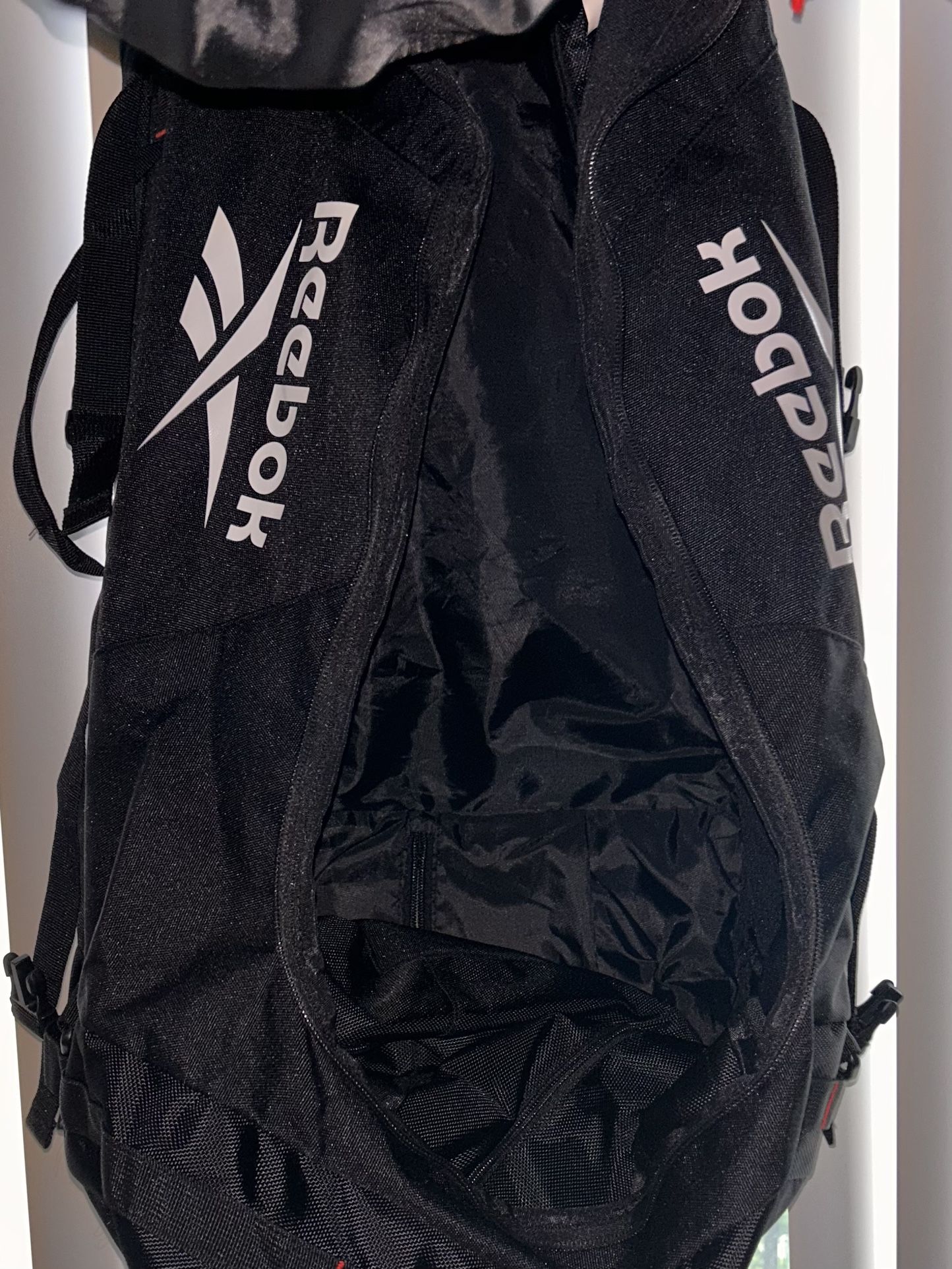 Reebok rolling best sale duffle bag