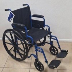 Wheelchair with Swing-Away Footrests and Flip-Back. Arms