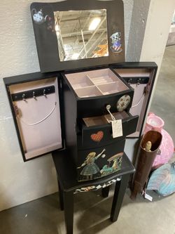 Alice in Wonderland jewelry armoire with “secret” side compartments