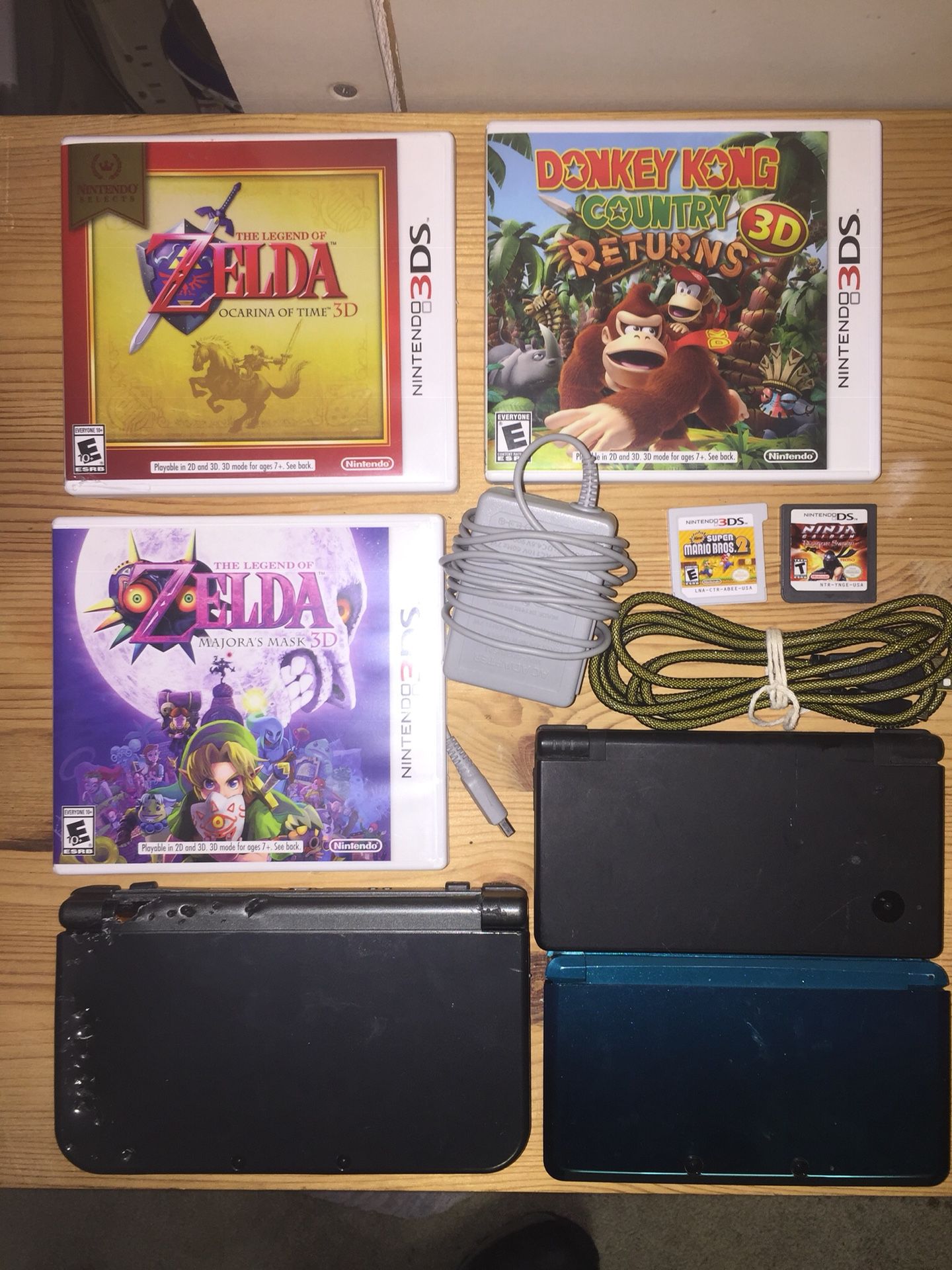 3ds xl, 3ds, ds , Zelda Majora’s Mask, Ocarina Of Time, Donkey Kong Country Returns, new super Mario Bros 2 Nintendo gameboy console bundle lot