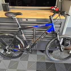 26" Trek 4500 Alpha Superlight Aluminum Mountain Bike. Disks brakes front and rear. Rock Shox Judy shock. 26"Specialized tires. Clip in style pedals. 
