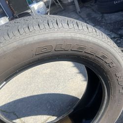 245/60R20 Bridgestone Tire 90% Good $50