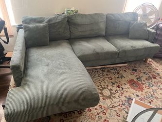 Green corduroy sectional couch