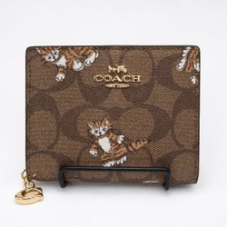 Coach Snap Wallet in Signature Canvas with a Dancing Kitten Print. 