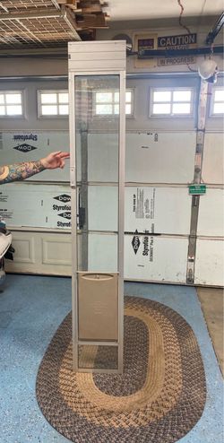 Sliding back door extension doggy door