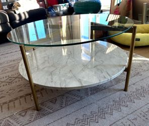 Modern Oval Glass Coffee Table with Faux Marble Shelf