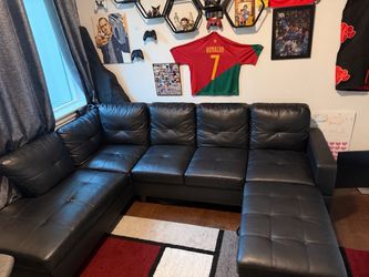 L sectional faux leather with ottoman