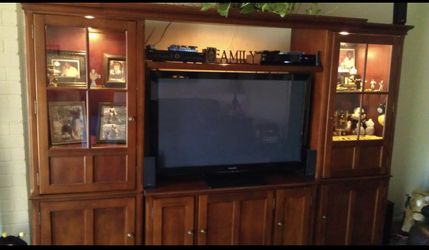 Entertainment Center By Ashley.   With Dimmer  Lighting.