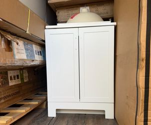 24” BATHROOM VANITY NEW WITH SMALL DAMAGE INSIDE BOT AFFECT THE VANITY