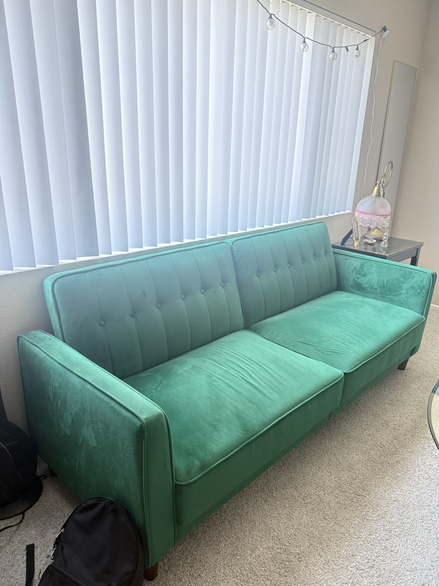 Emerald green futon couch