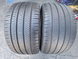 2 USED TIRES PIRELLI 265/35/22