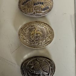 Belt Buckles And A Bell