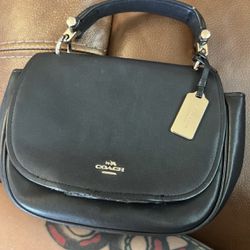 PRICE FIRM:  Trendy Black Coach Purse With Wear