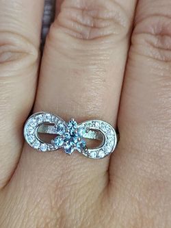 Beautiful created Tanzanite and topaz infinity silver filled ring size 10