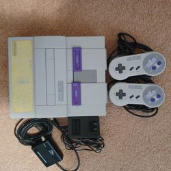 Super nintendo console plus game