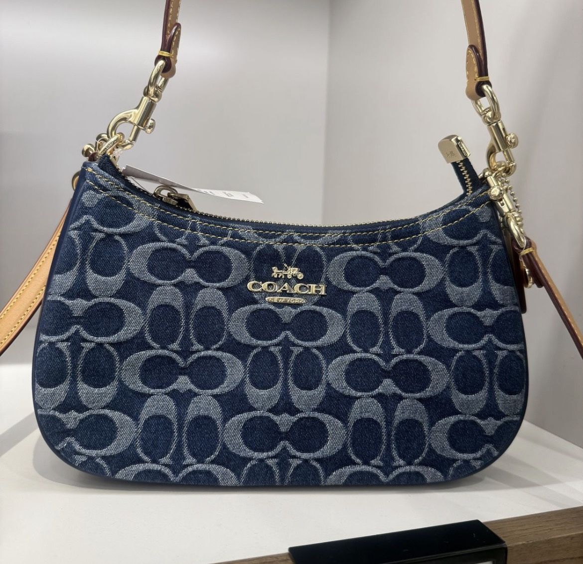 navy blue coach purse